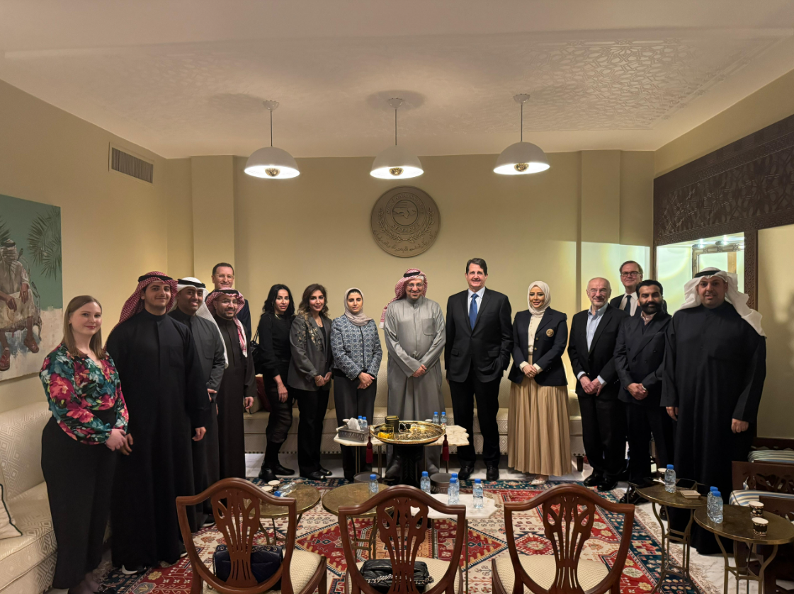 group of presenters and attendees posing at event